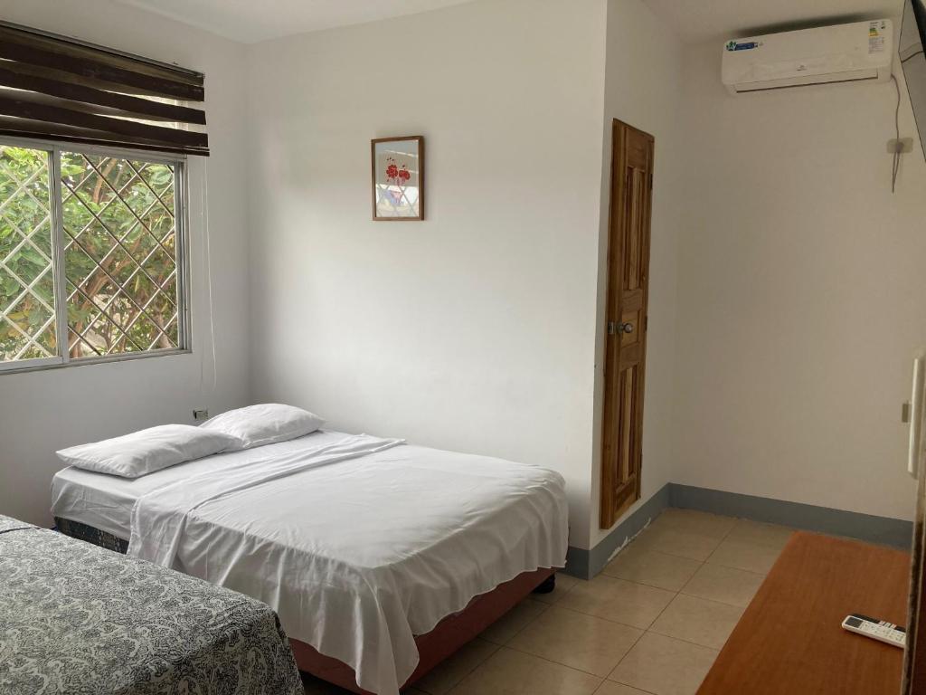 Liza, habitación privada de Flor de Lis Beach House